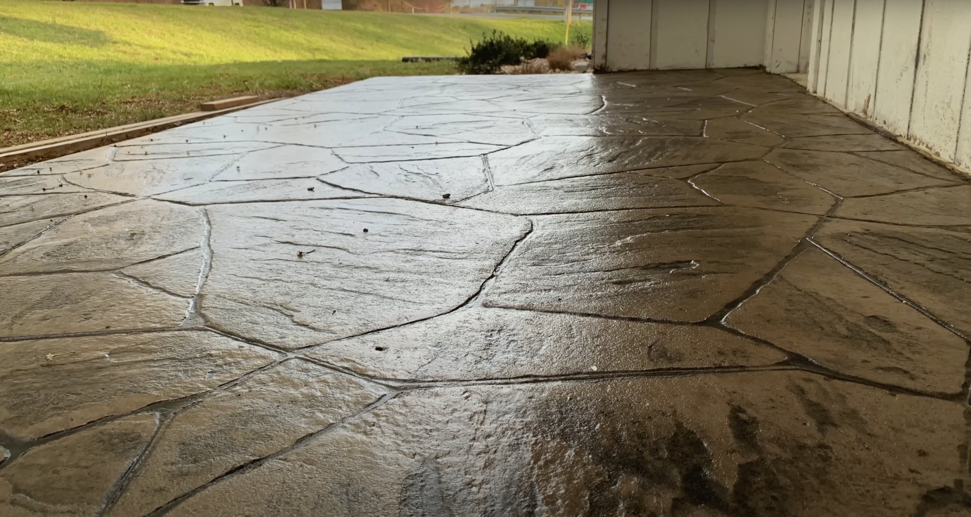 Concrete Driveway Repair and Resurfacing Project Cracked concrete driveway requiring professional repair and resurfacing services