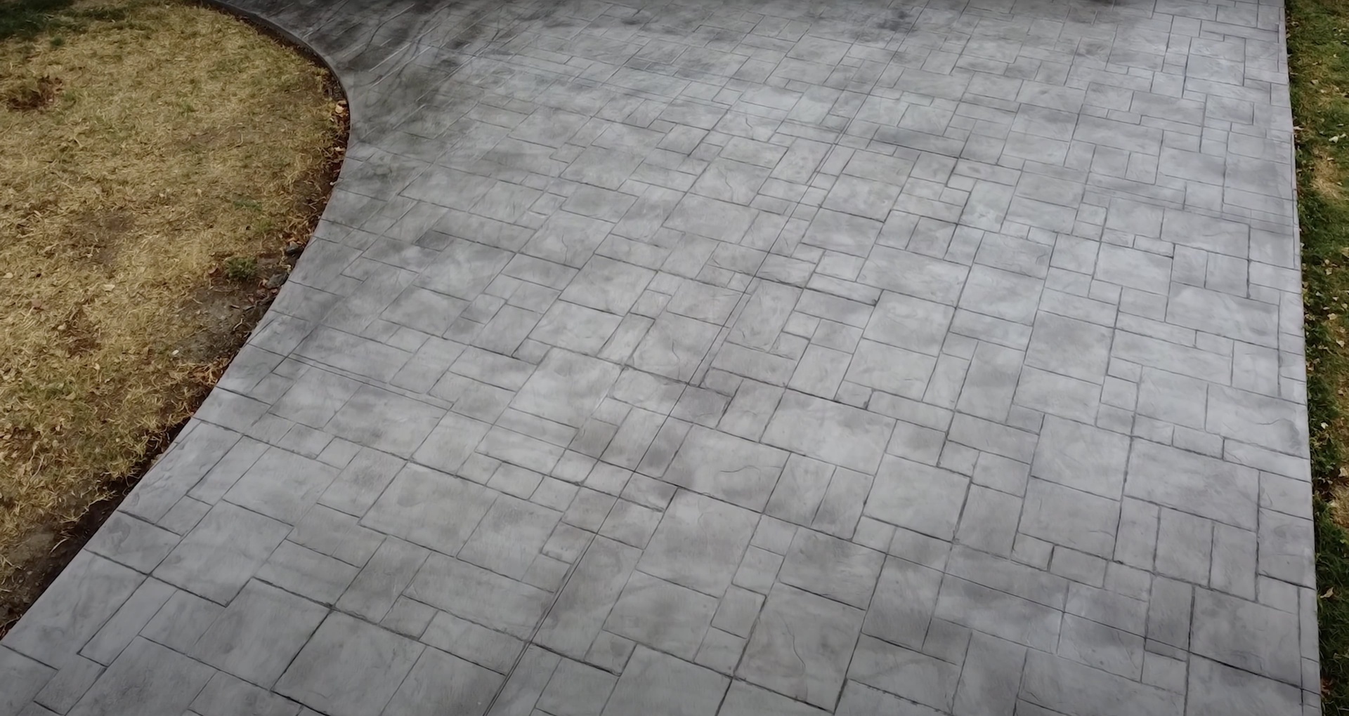 Beautiful concrete patio construction with decorative stamped patterns